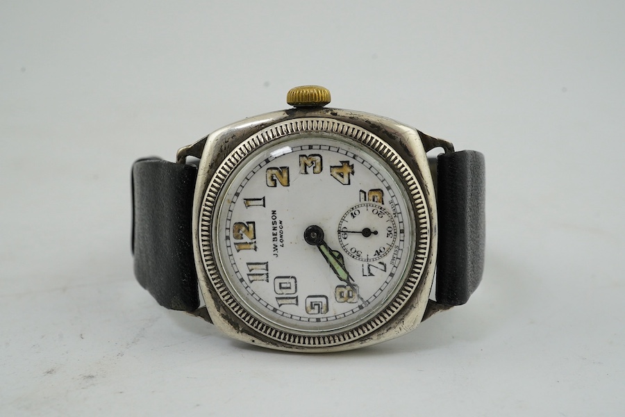 A George V silver military? manual wind wrist watch, case import marked for London, 1915, and a silver J.W. Benson manual wind wrist watch. Condition - poor to fair